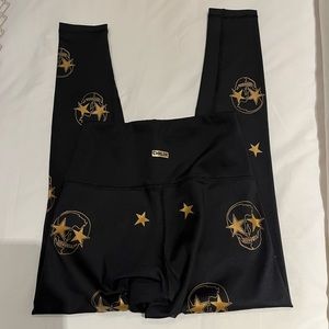 CHRLD GOLD SKULL METALLIC BLACK LEGGINGS SIZE SMALL